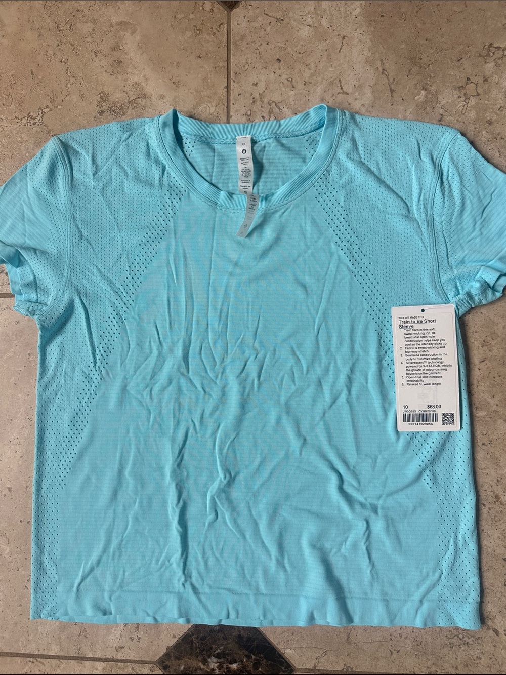 Lululemon NWT Ladies 10 Lt Blue Short Sleeve “Train to Be Short sleeve” Tee
